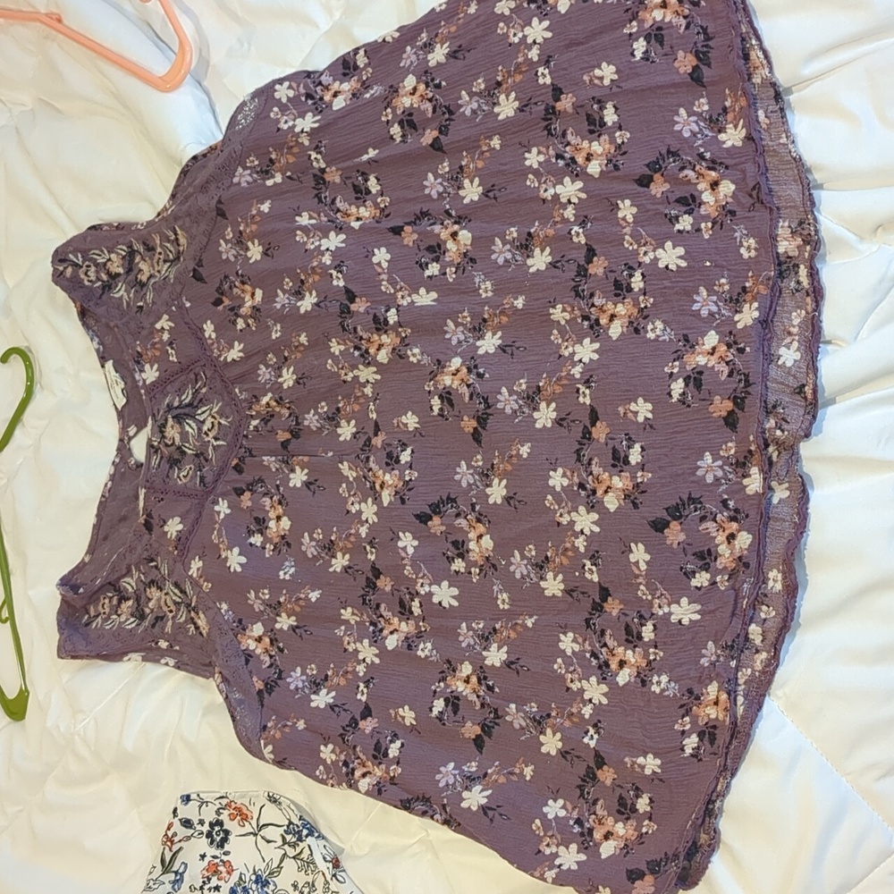 Purple floral sleeveless blouse